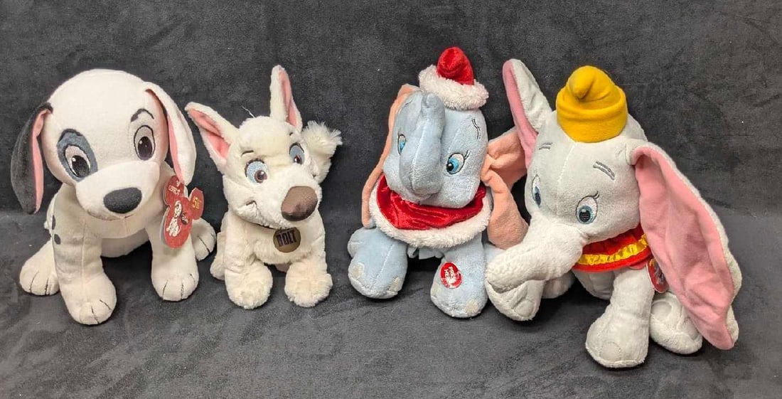 Disney Dumbo Bolt 101 Dalmatians Plush Lot Of 4: Disney Dumbo Bolt 101 Dalmatians Plush Lot Of 4. This lot includes: (1) "Just Play" Dumbo Plush. Has electronic feature that was not tested. Requires 3 AA batteries (not include). Is 10"