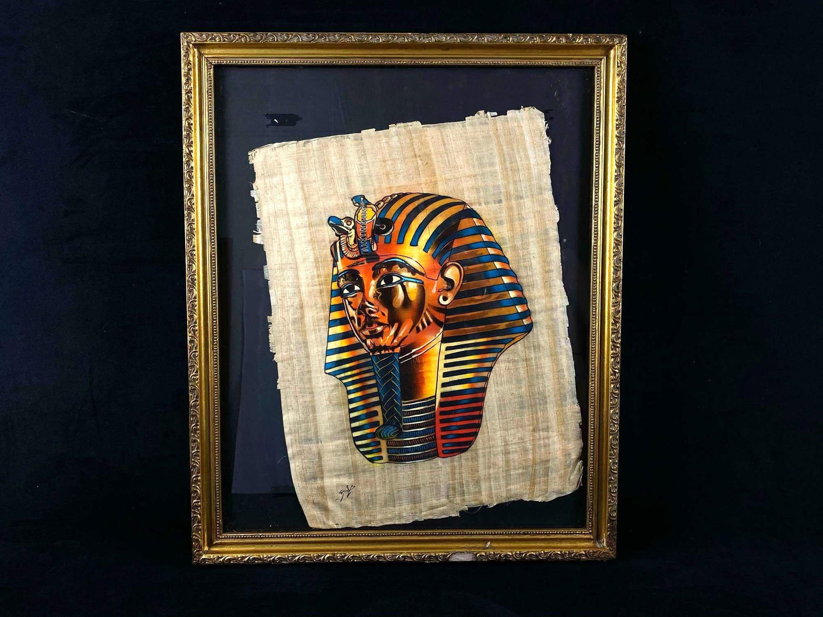Egyptian Pharaoh King Tutankhamon Famous " Mask " Papyrus Vintage Signed Nile Art Painting: Egyptian Pharaoh King Tutankhamon Famous " Mask " Papyrus Vintage Nile Art .Paintings shifted as shown and would have to be centered again ( easy fix) . Measurements are 18" x 22" 4.3 lbs