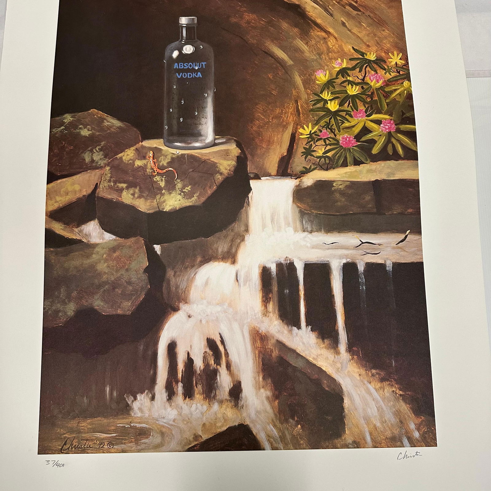 Absolut Vodka Statehood Print West Virginia Michael Christie Hand Signed and Numbered: Limited edition Absolut Vodka “Statehood” lithograph print on paper. Features the iconic Absolut bottle set against a stylized West Virginia-themed landscape. Hand-signed by the artist, Micha