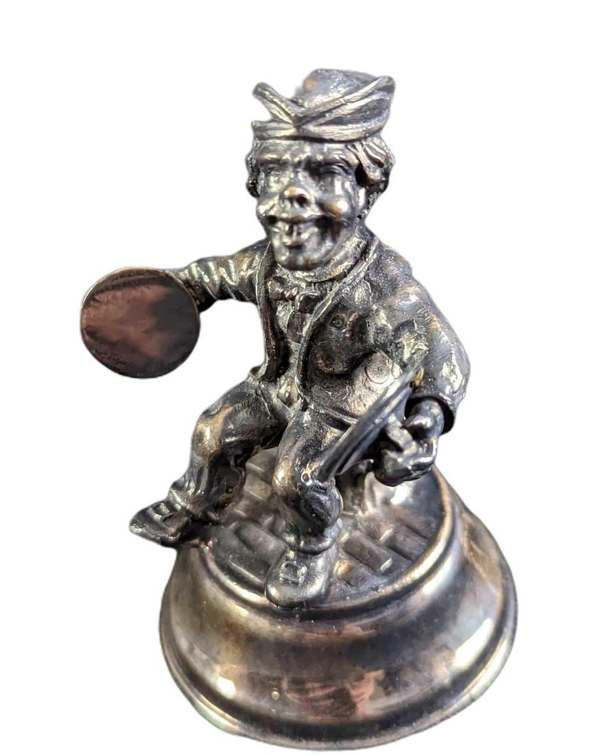 Vintage Silver Plated Man With Cymbals Figurine: Vintage Silver Plated Man With Cymbals Figurine. Made in Spain. Is approx 2 1/2" x 2 1/4" x 3 3/4" and it weighs 0.58lb. The figurine is in a good, vintage condition with some light surface tarnish.