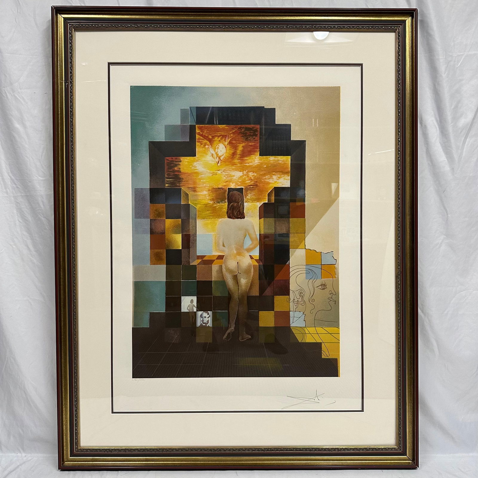 Lincoln in Dalivision Surrealist Salvador Dali Framed Lithograph: Framed numbered edition lithograph print depicting a nude female figure viewed from behind facing a glowing cross-form with dove motif, with geometric checkerboard style blocks and line-drawn profile