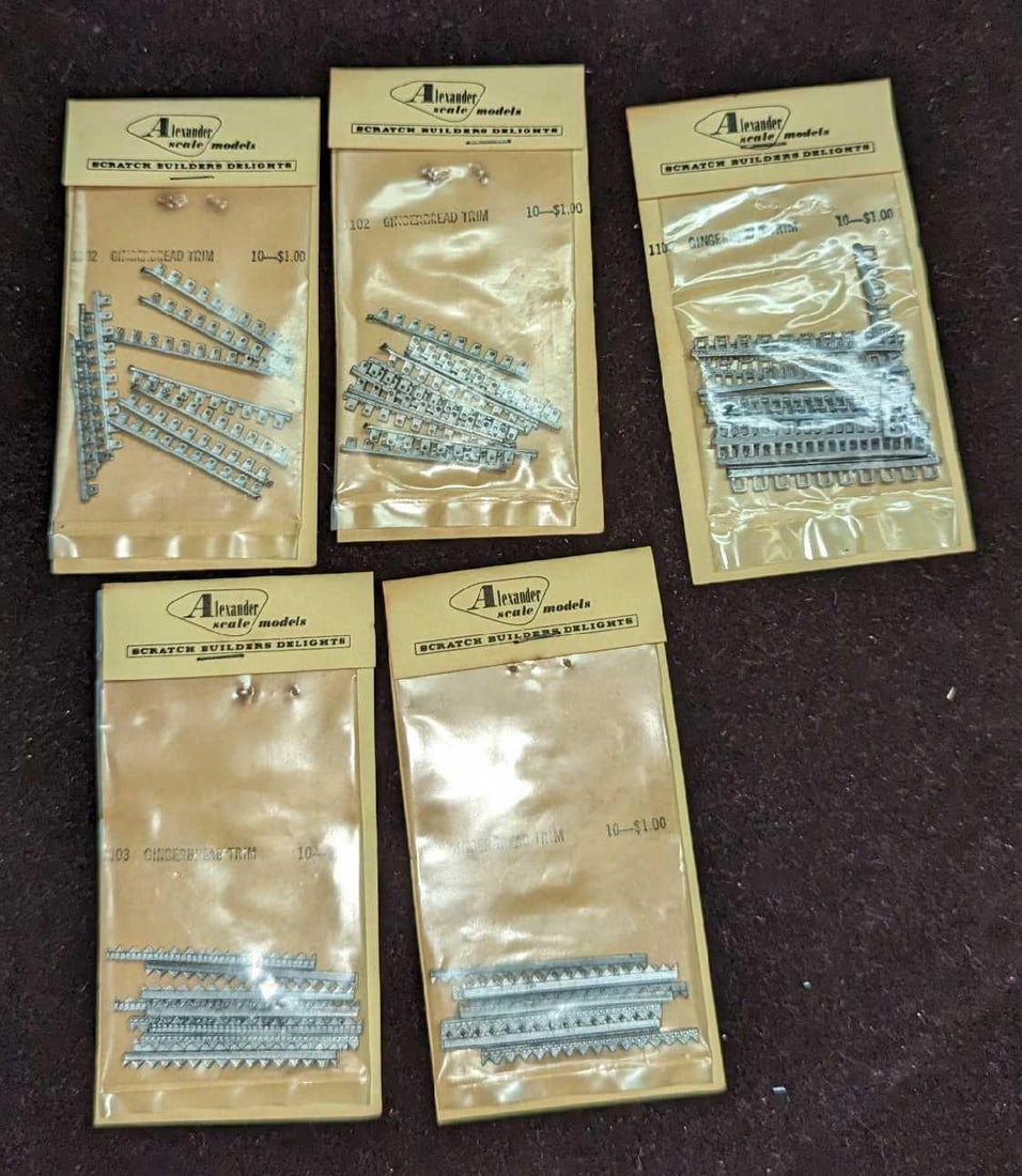 Alexander Scale HO Gingerbread Trim & Porch Roof Supports: Alexander Scale HO Gingerbread Trim & Porch Roof Supports. This lot includes: (5) Alexander Scale HO #1103 Gingerbread Trim (10pcs) (1:87th Scale). Each sealed package is approx 2" x
