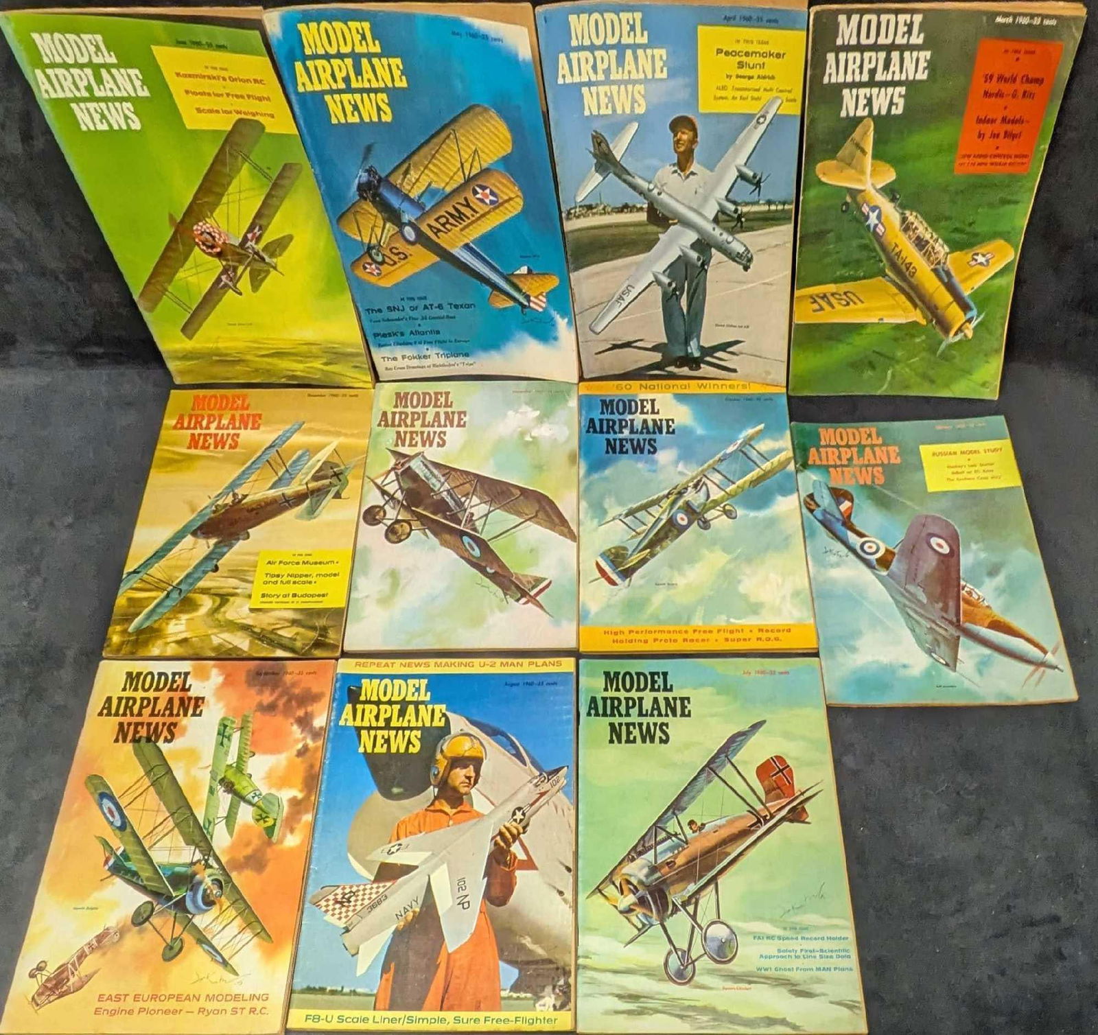 11 Issues Of Model Airplane News 1960: 11 Issues Of Model Airplane News 1960. This lot is missing January. Each of the magazines is approx 8 1/4" x 1/8" x 11" and the total weight is 2.80lbs. The magazine covers have some shelf wear and th