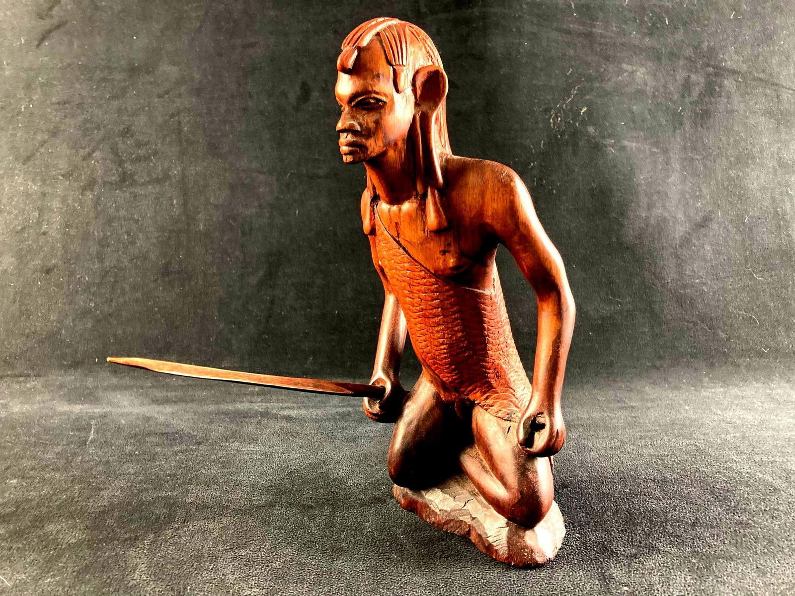 Aboriginal Wooden Warrior Display: This lot includes: (1) Aboriginal Wooden Warrior Display Condition is used and see photographs for additional details. The figure is wooden and depicts an aboriginal warrior. He is holding