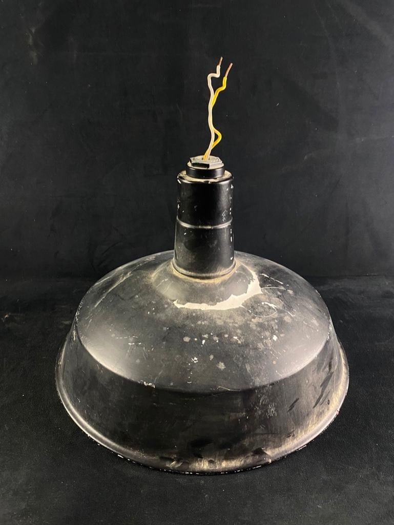 Industrial Ceiling Light: Industrial Ceiling Light Enamel over steel light fixture in an industrial style with top painted black. This light hardwires into a standard electrical system and takes an E39 mogul light bulb