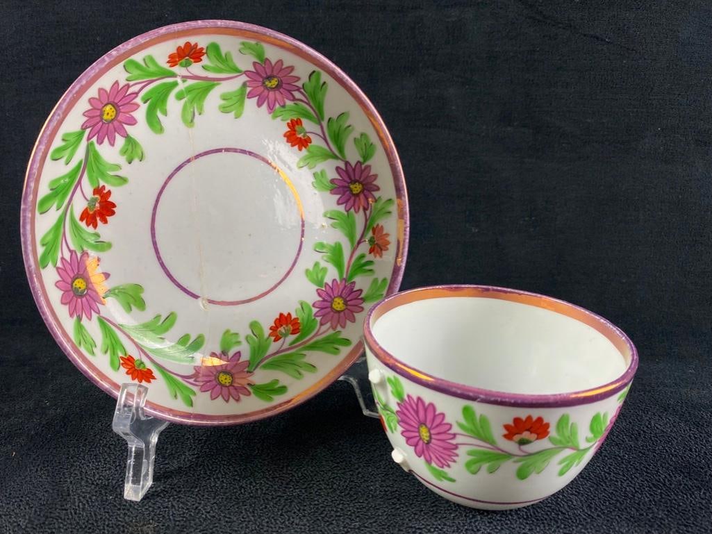 Antique Pink Lustreware Cup & Saucer: Antique Pink Lustreware Cup & Saucer Pink Lustreware porcelain cup and saucer from the early 1800s, made in England. These porcelain sets with the trademark pink pearlescent designs were