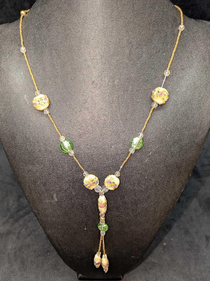 Vintage Italian Murano Cream Art Glass Bead Necklace MM: Vintage Italian Murano Cream Art Glass Bead Necklace MM. Glass beads with hand painted designs. Is approx 32" and it weighs 0.16lb. The necklace is a little loose and you can see the string.