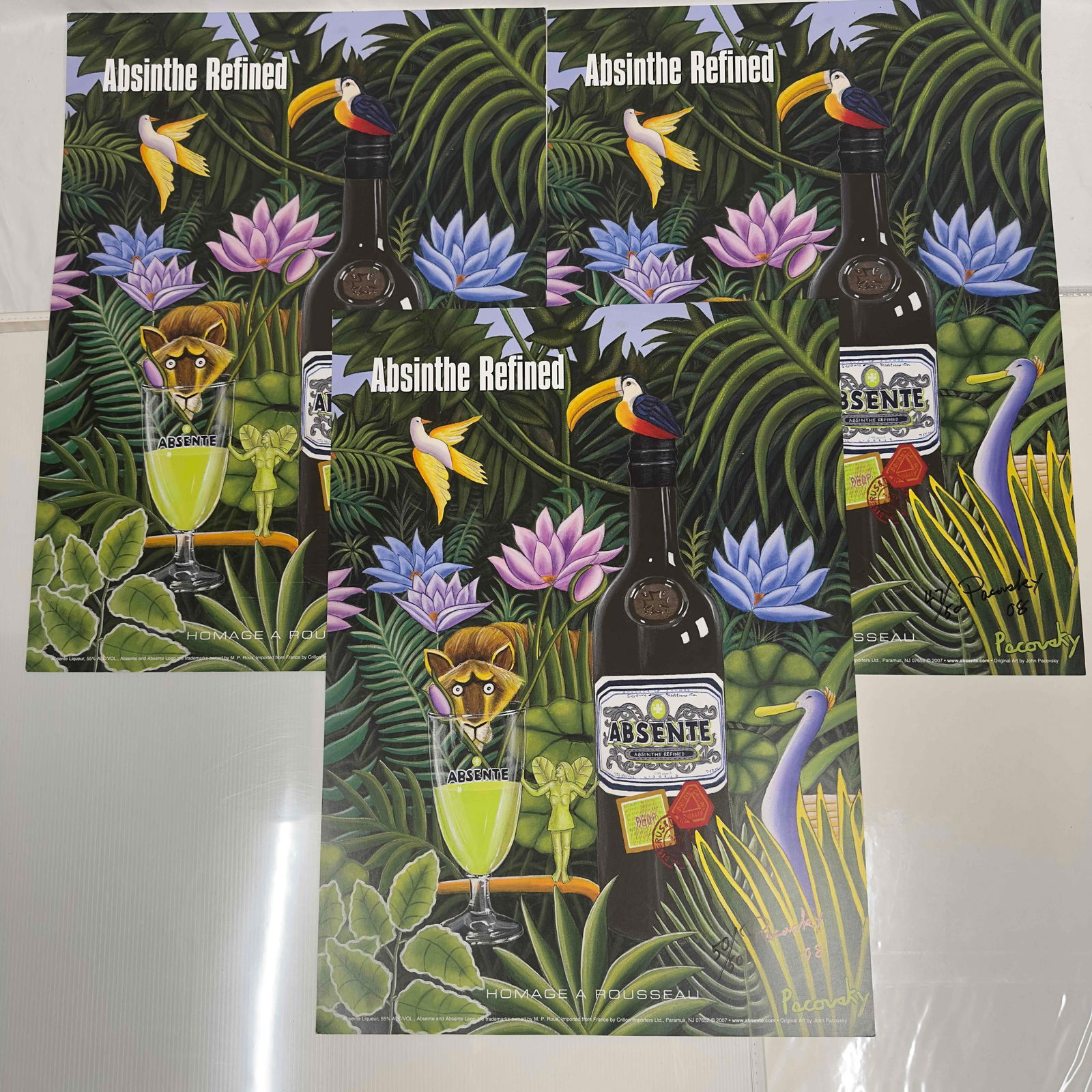 Absinthe Refined Ad Poster Homage A Rousseau by John Pacovsky Hand Signed and Numbered: Absinthe Refined Ad Poster Homage A Rousseau by John Pacovsky Hand Signed and Numbered. This set includes three (3) hand signed and numbered posters by John Pacovsky. Limited Edition 50, from 2008. A