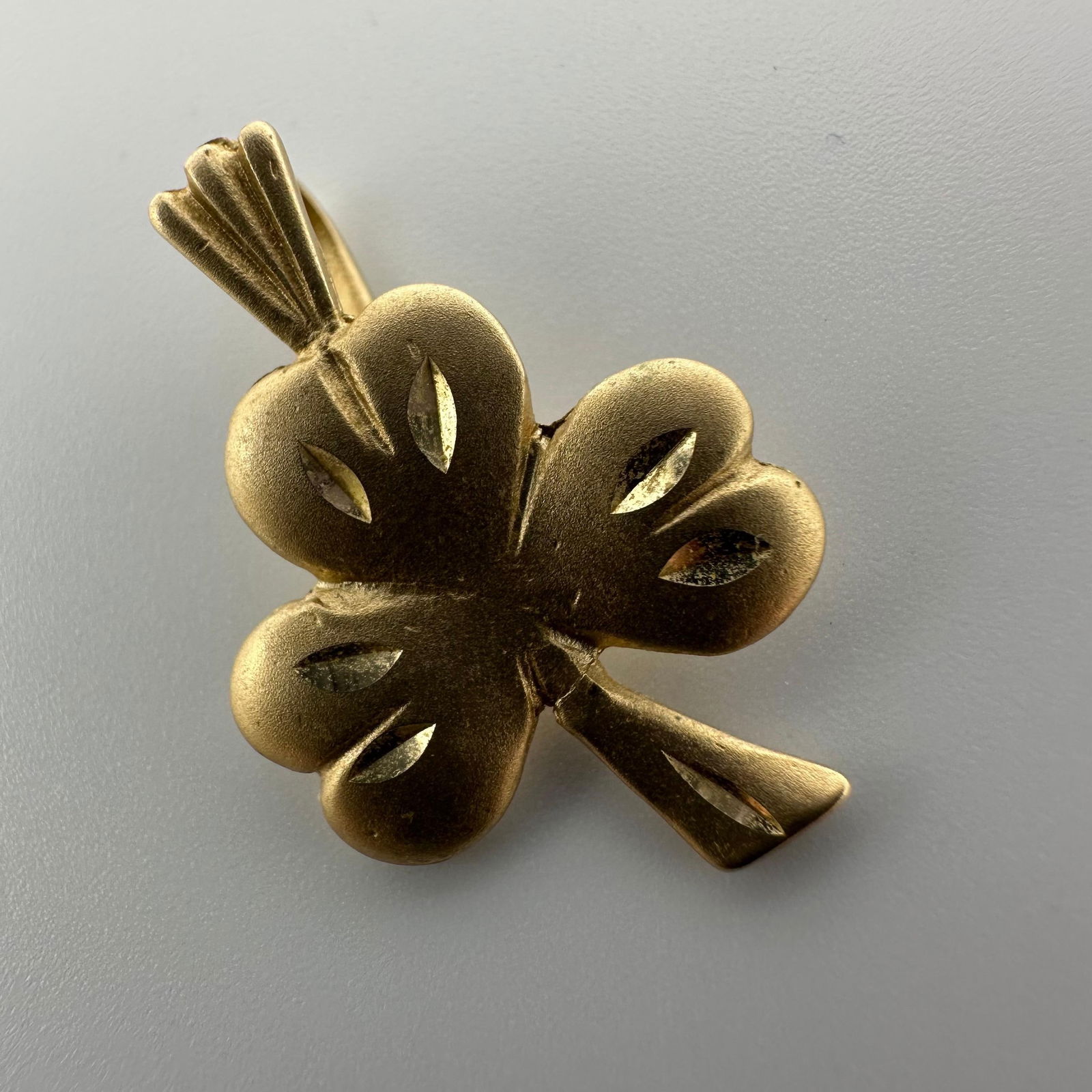 14K Gold Three Leaf Clover Shamrock Pendant W69: This item is in good pre-owned, previously used/displayed condition with noticeable light wear and surface scratches. Please reference all photos for full details. This piece of jewelry has been teste