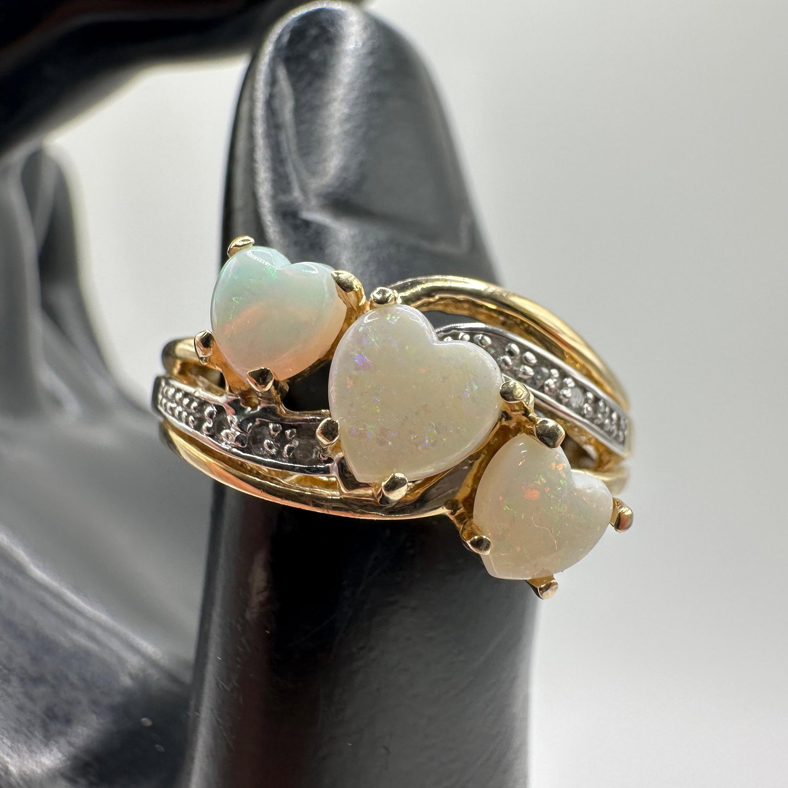Triple Heart Shaped Opals Accent Diamonds 14K Gold Ring: This item is in good pre-owned, previously used/displayed condition with noticeable light wear and surface scratches. Please reference all photos for full details. This piece of jewelry has been teste