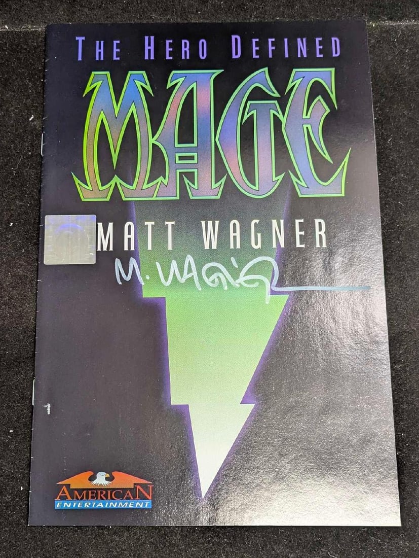 Matt Wagner Autographed The Hero Defined Mage #0 With COA: Matt Wagner Autographed The Hero Defined #0 Mage With COA. Mage #0 comes with a COA from Wizard. The comic is approx 6 3/4" x 10 1/2" and it weighs 0.13lb. The covers have some small markings and smal