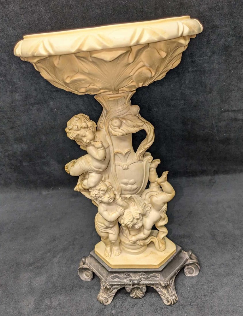 Vintage Santini Resin Cherubs Bird Bath Flower Stand: Vintage Santini Resin Cherubs Bird Bath Flower Stand. This is approx 10" x 6 1/2" x 17 1/2" and it weighs 8.10lbs. This has some markings from age and use. Please see the images as they are part of th