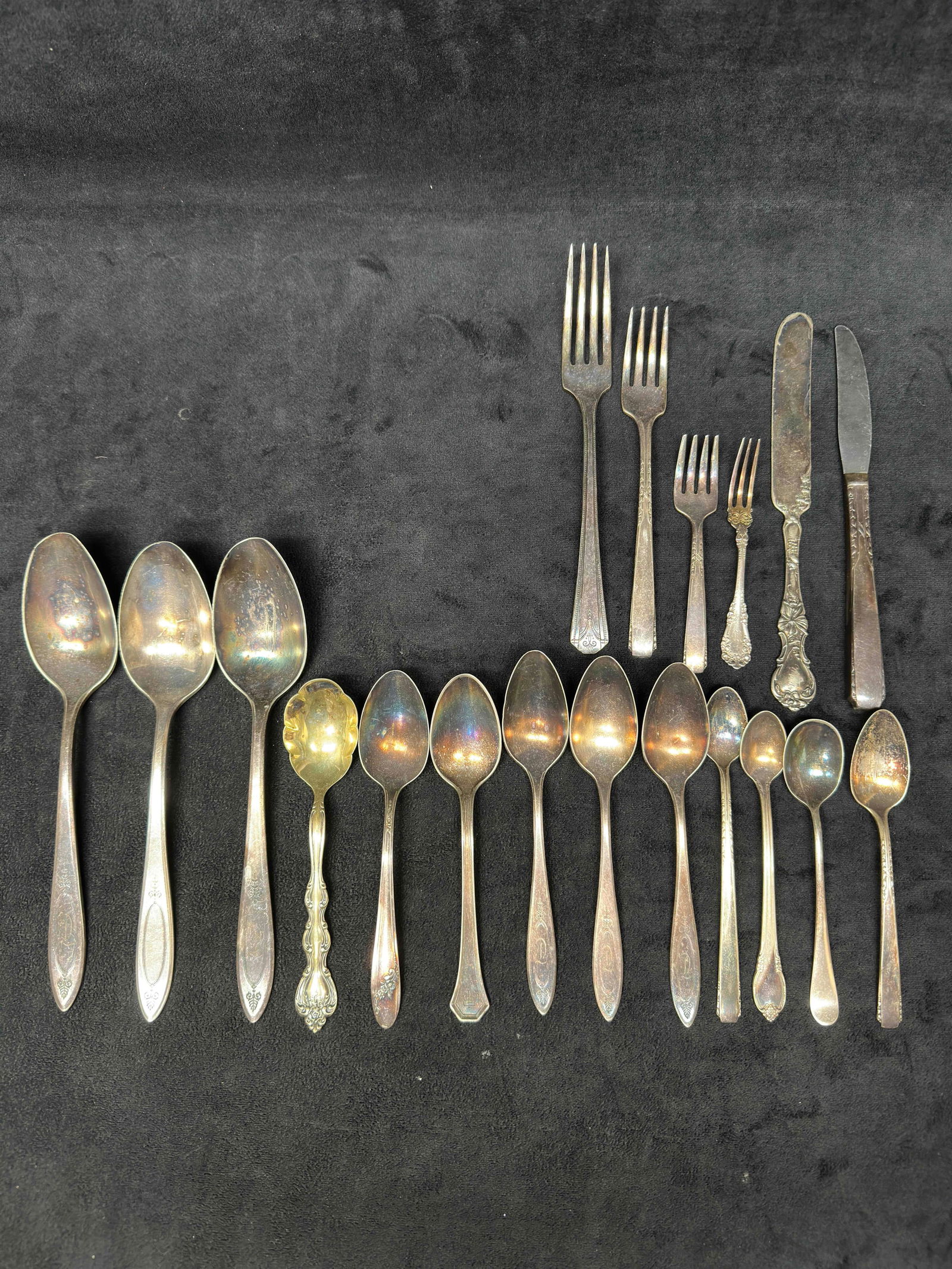 Various Silverware Serving Set Silver Plated Flatware Lot of 20: Various Silverware Serving Set Silver Plated Flatware Lot of 20. Each piece has a unique design with some markings on the back. A few pieces are marked silver plated. Each piece has various