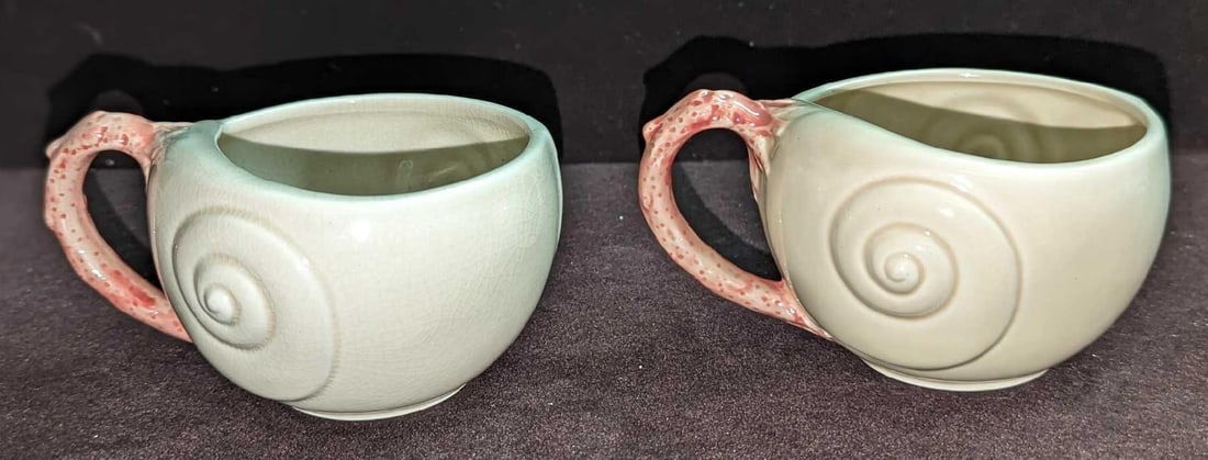 2 Vintage Retired Fitz & Floyd Oceana Flat Cups G K57: 2 Vintage Retired Fitz & Floyd Oceana Flat Cups G K57. This retired series was originally released in 1977. Each cup is approximately 5" x 4" x 2 1/2" and the total weight is 0.59lb.