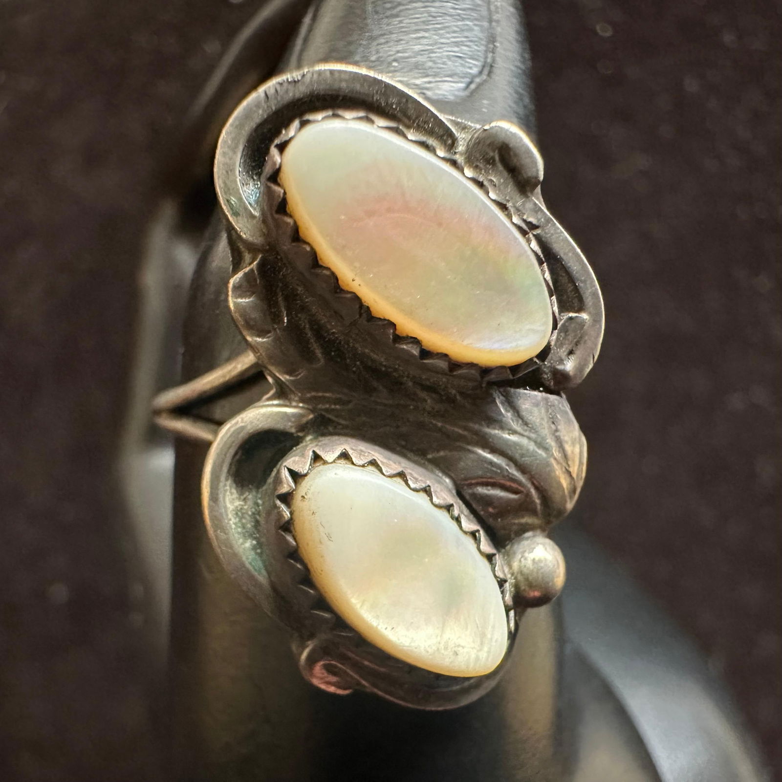 Two Mother of Pearl Inlay Setting Silver Ring Navajo Style Motif: This item is in good pre-owned, previously used/displayed condition with noticeable light wear and surface scratches. Please reference all photos for full details. This piece of jewelry has been