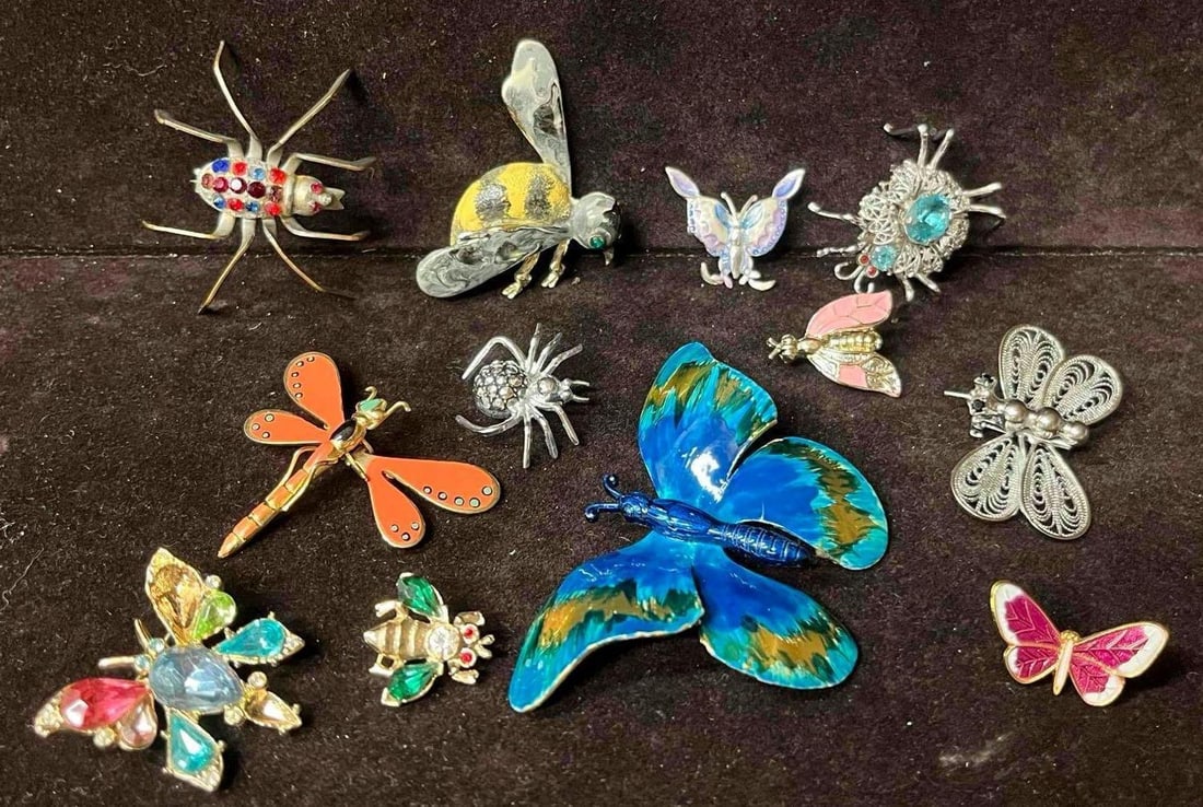 Costume Brooch Insect Bundle: This lot contains a Costume Brooch Insect Bundle. The bundle fits in a small 6 3/4" x 6 1/2". Total weight is 2.6oz. Overall the brooches are in good pre owned condition. One of the butterflies