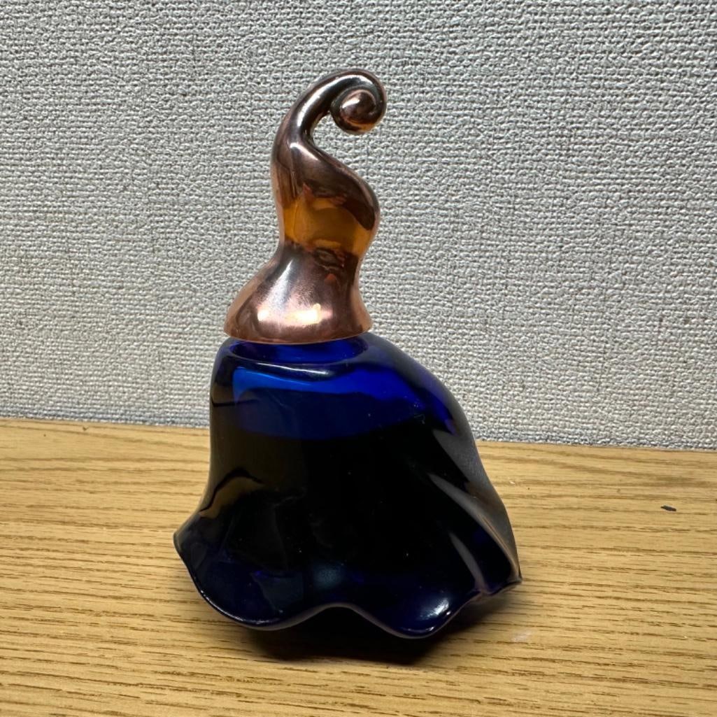 Gitane by Raison Pure Perfume Cobalt Glass Bottle: Gitane by Raison Pure Perfume Cobalt Glass Bottle Vintage cobalt glass bottle of Gitane by Raison Pure, with copper stopper top. Bottle is almost completely full. In good condition, with some