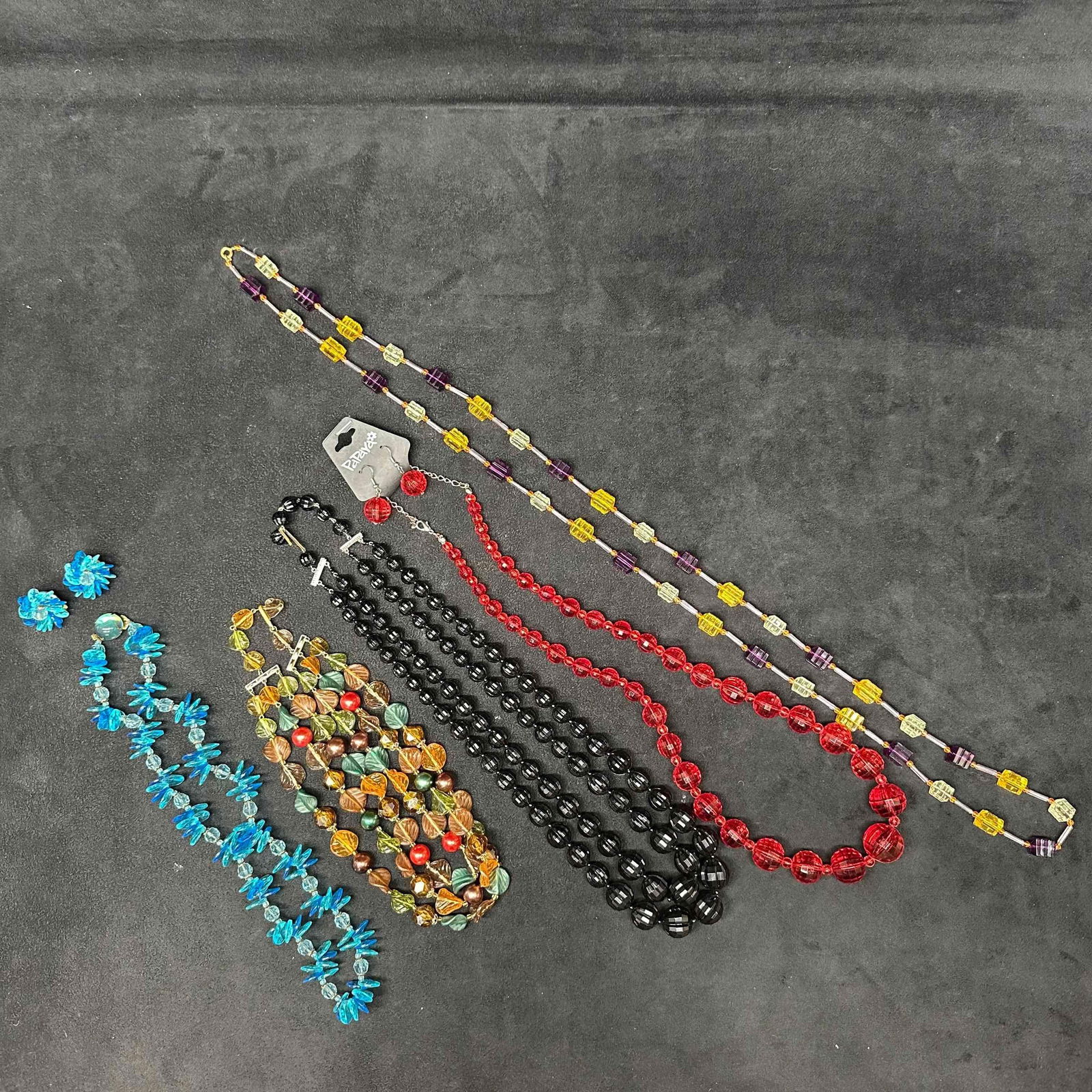 Costume Jewelry Plastic Bead Necklace and Earrings Set H92 Leaf Faceted Beads: Necklaces with multi colored, themed, and shaped plastic beads with beautiful designs. Each necklace features various designed faceted plastic beads with some beautiful accents. Thw of the necklaces