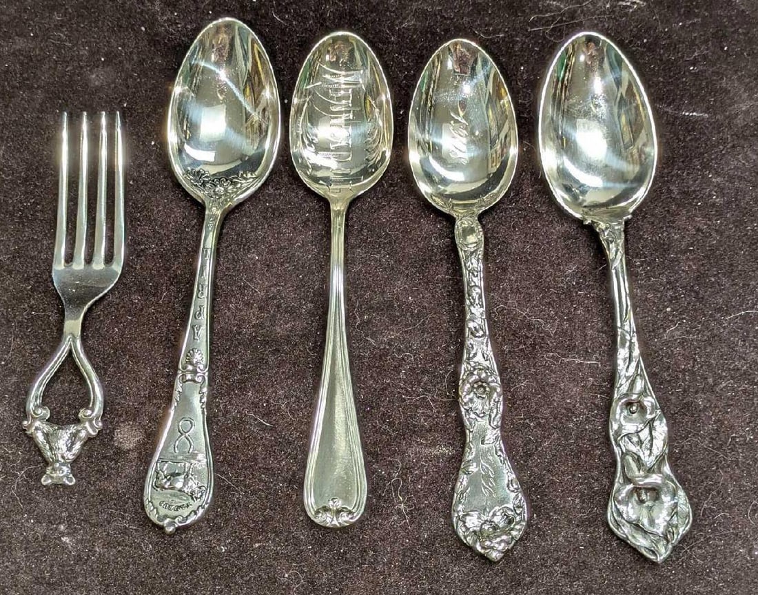 5 Vintage Sterling Silver Spoons And Fork: 5 Vintage Sterling Silver Spoons And Fork. This lot includes: (1) Vintage Sterling Silver Baby Fork With Teddy Bear. This is approx 3/4" x 3/8" x 4 1/4". (1) Vintage Sterling Silver Flora