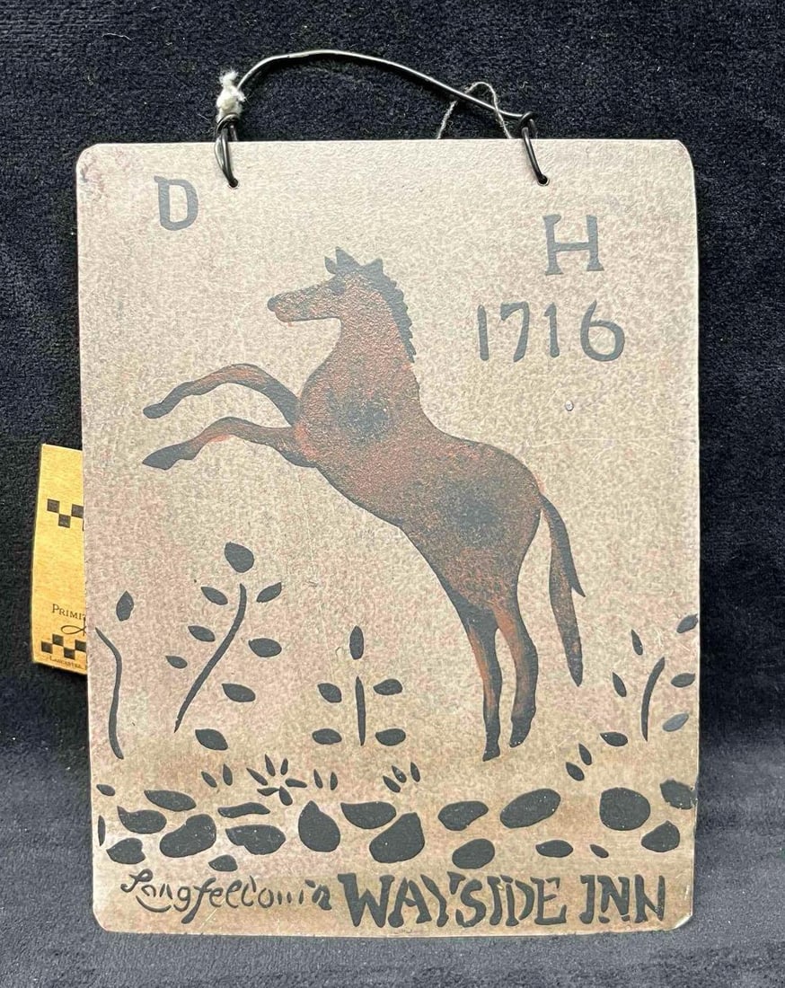 Decorative Tin Sign Longfellow's Wayside Inn: This lot contains a Decorative Tin Sign Longfellow's Wayside Inn. It is approx 6 3/4" x 5". Total weight is approx 1.5oz. Overall the decorative tin sign is in good pre owned condition with no noticea