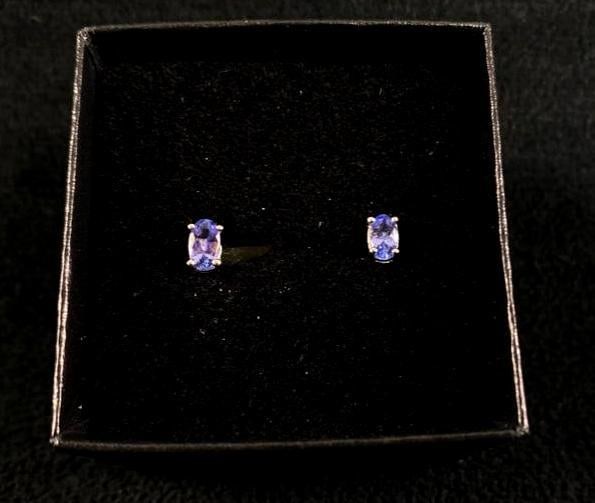 Silver Tanzanite Stud Earrings: Silver Tanzanite Stud Earrings These beautiful tanzanite solitaire earrings are made of .925 silver. The stones are approximately 3mm across by 5mm across at their widest points. They come in a