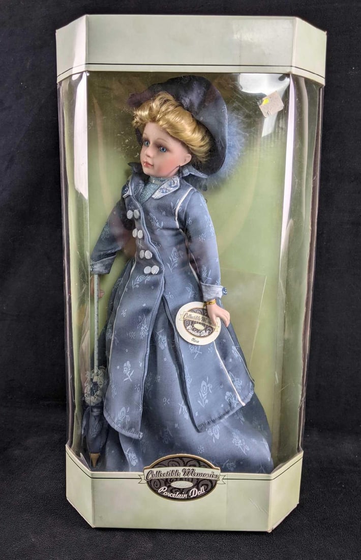 Collectible Memories Porcelain Doll Sealed Box: Collectible Memories Porcelain Doll Sealed Box This is a sealed box of a Collectible Moments doll. This doll and box are in good condition with no known damage. Box size: 10in x 5 1/2in x 18 1/2in Ap