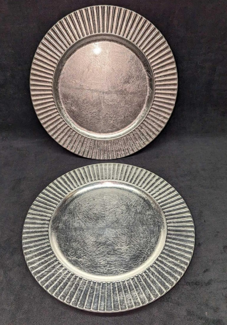 2 Lenox Plastic Round Charger Plates B: 2 Lenox Plastic Round Charger Plates A. Each plate is approx 12 7/8" x 12 7/8" x 1/4" and the total weight is 1.75lb. The plates have some signs of wear and markings on the back. Please see the images