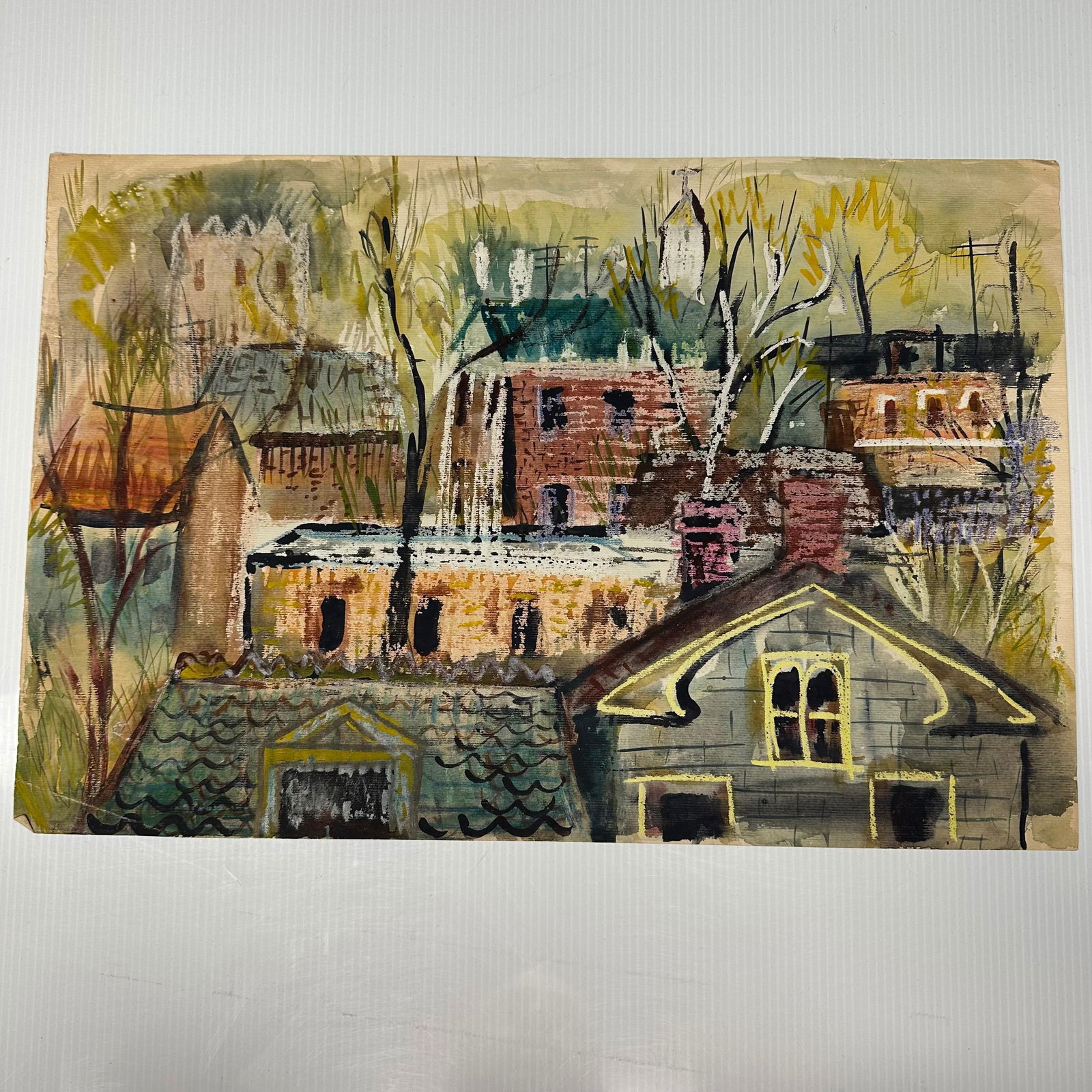 Mid-Century Modern Style Mixed Media Townscape Painting: Original mixed media painting on paper depicting a stylized townscape with clustered buildings, rooftops, trees, and a church steeple in the background. Executed in watercolor and ink with expressive