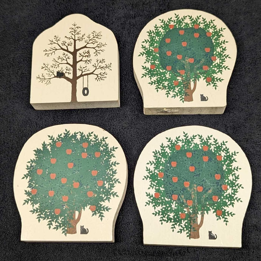 4 Cat's Meow Wood Apple Trees & Tree Shelf Sitter: 4 Cat's Meow Wood Apple Trees & Tree Shelf Sitter. This lot includes: (3) Apple Trees. Each is approx 3 3/4" x 3/4" x 3 7/8".(1) Tree Shelf Sitter. This is approx 3" x