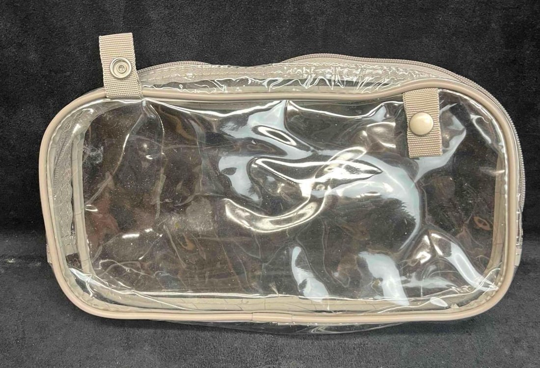 Small Clear Vanity Travel Case: This lot contains a Small Clear Vanity Travel Case. It is approx 7" x 12" x 2". Total weight is approx 3.6oz. Overall the Clear Vanity Case is in good pre owned condition with some wear fro