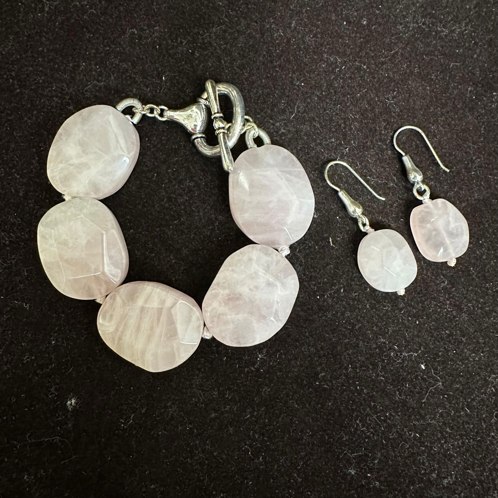 Ralph Lauren Rose Quartz Pink Stone Earrings and Bracelet Set: This is a set of rose quartz and silver-tone Ralph Lauren costume jewelry, including a chunky stone bracelet with a toggle clasp and matching drop earrings. These items are in good pre-owned, previous