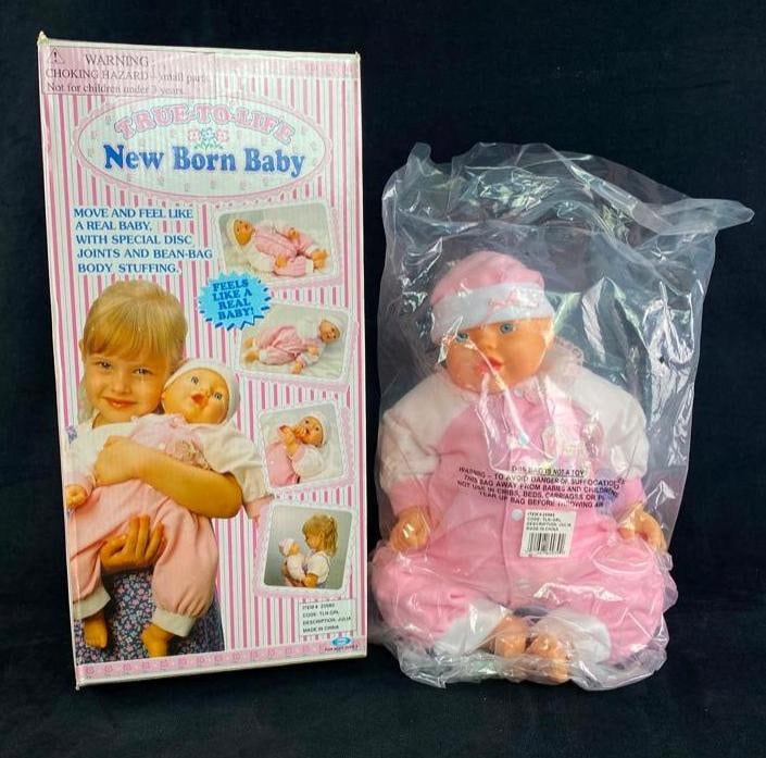 True-to-Life New Born Baby (2000): True-to-Life New Born Baby (2000) This vintage baby doll toy was designed to move and feel like a real newborn baby. It comes in mint condition, still sealed in the original bag inside the box. Ther