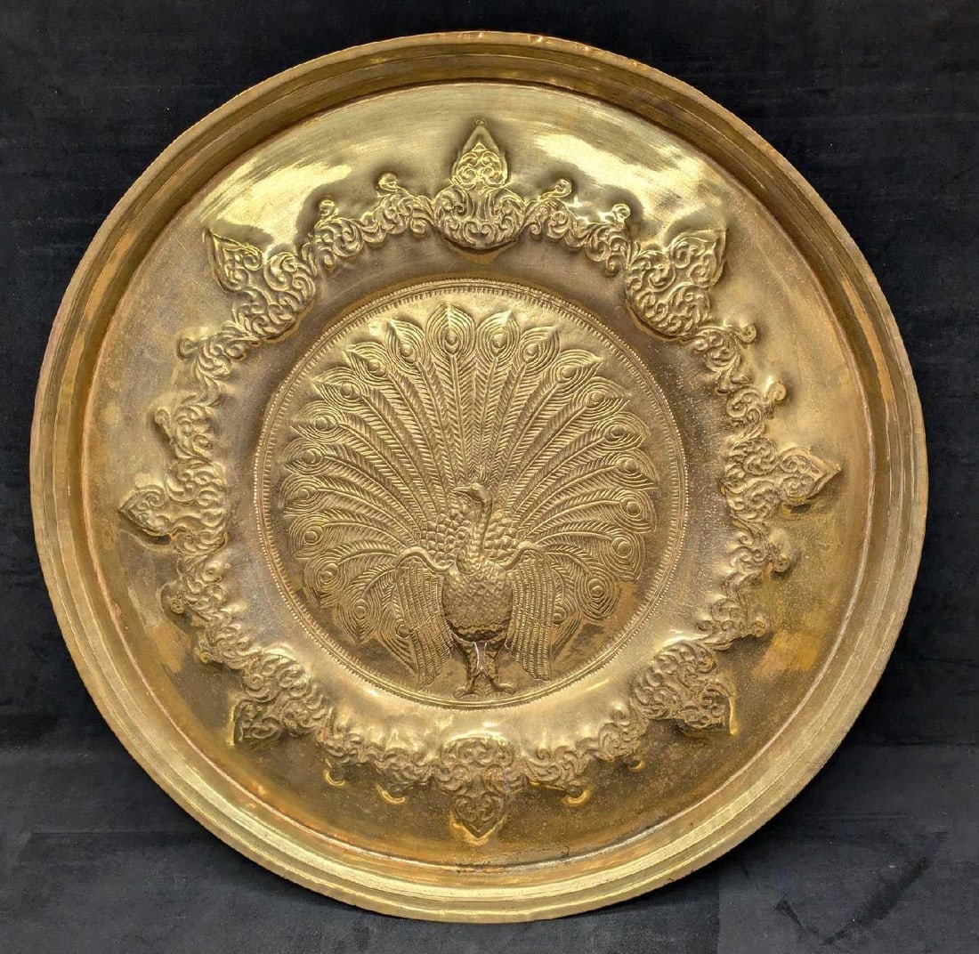 Vintage 26" Brass Wall Plate With Ornate Peacock Motif: Vintage 26" Brass Wall Plate With Ornate Peacock Motif. The maker and date of creation is unknown. This is approx 26 1/2" x 26 1/2" x 2" and it weighs 9.60lbs. The plate has some tarnish and