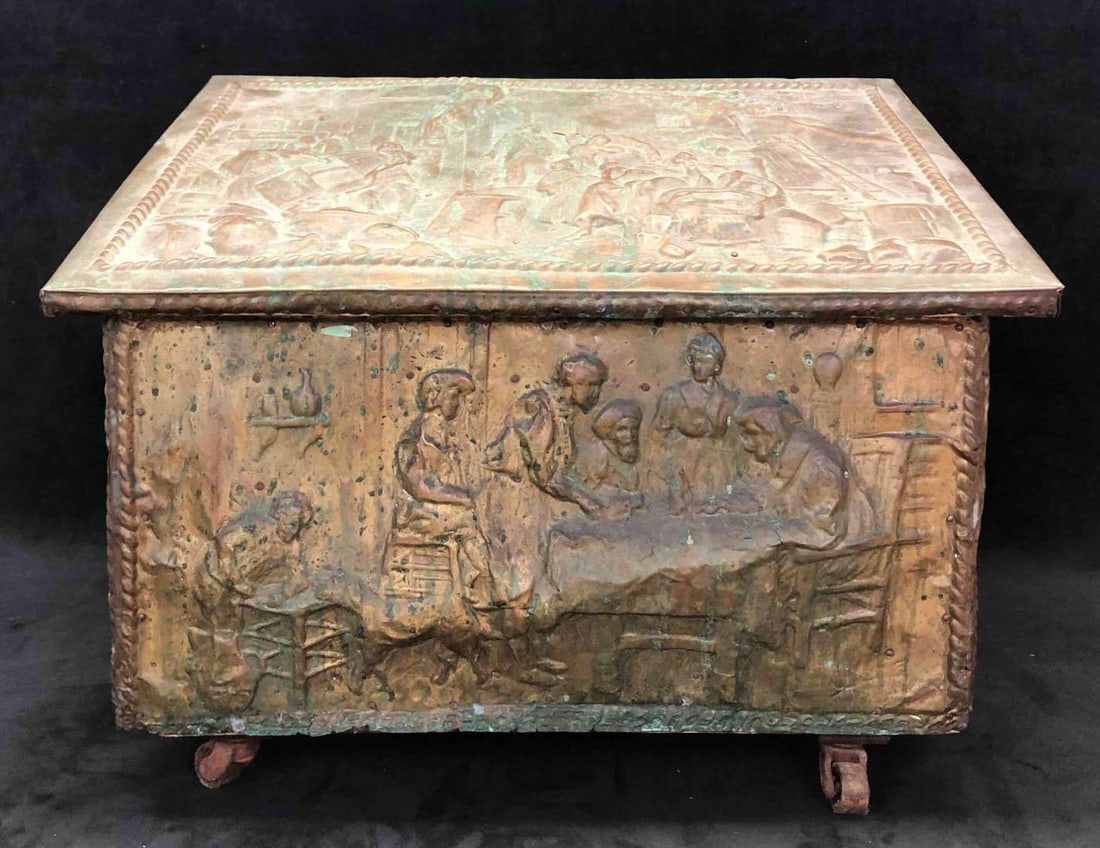 Vintage Wood Kindling Box With Brass Design: This lot contains a vintage wood kindling box with a brass design. The box has a wood frame with an applied plaster layer that support the embossed brass decorative around the exterior. It is app