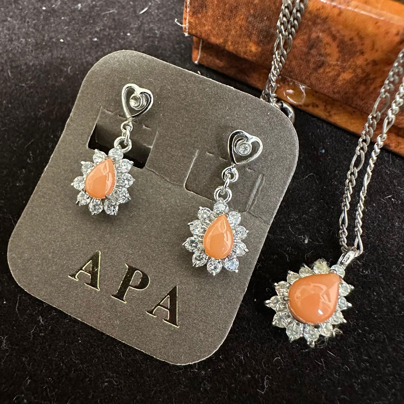 Coral Cubic Zirconia Sterling Silver Jewelry Set Earrings and Necklace: This item is in good pre-owned, previously used/displayed condition with noticeable light wear and surface scratches. Please reference all photos for full details. This piece of jewelry has been