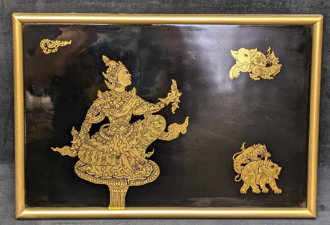 Vintage Framed Thailand Black And Gold Lacquered Deity Panel: Vintage Framed Thailand Black And Gold Lacquered Deity Panel. This is approx 18 3/4" x 3/4" x 12 3/4" and it weighs 1.80lb. There are some scratches on the black lacquer.