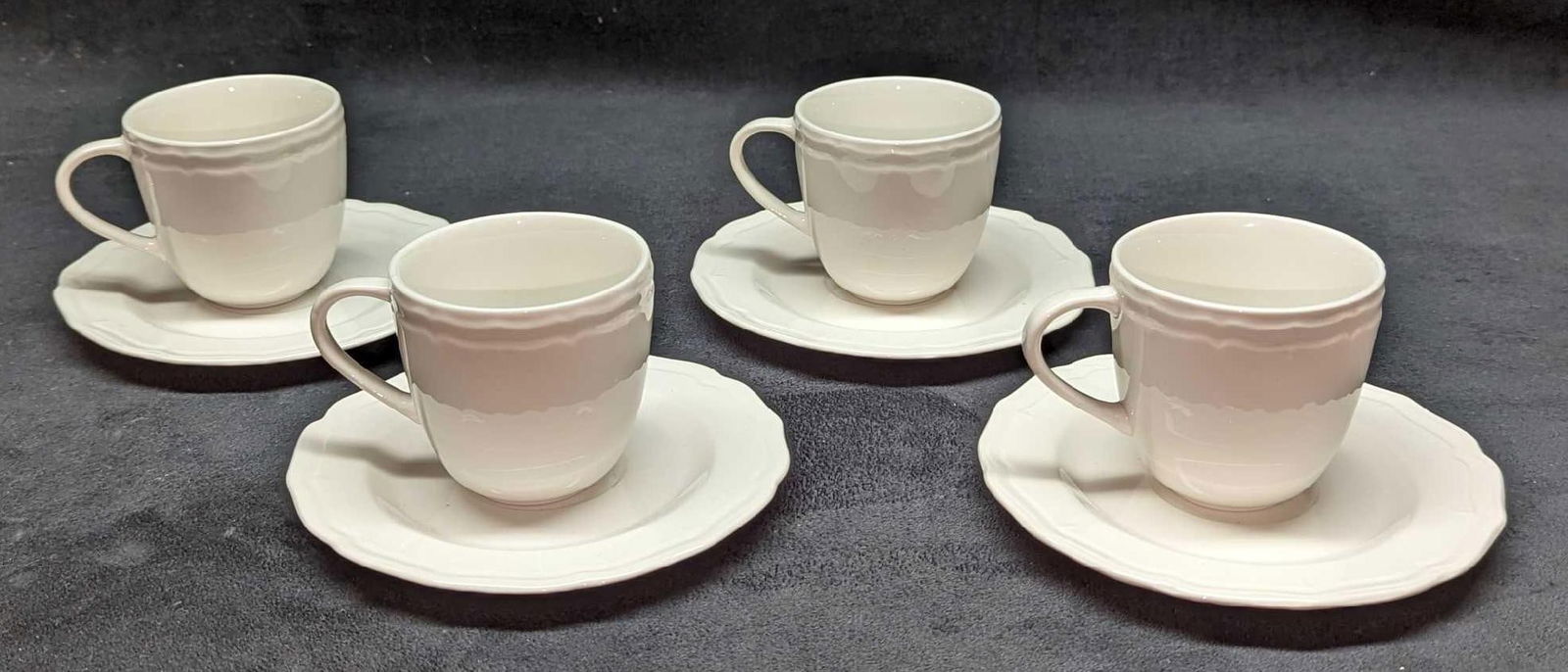 4 Gibson Designs Miranda China Cups & Saucers: 4 Gibson Designs Miranda China Cups & Saucers. The saucers are approx 6 1/4" x 1 1/2" x 6 1/4" and the total weight is 1.48lb. Each cup is approx 4 1/4" x 3" x 3" and the total weight is 1.45lb. The c