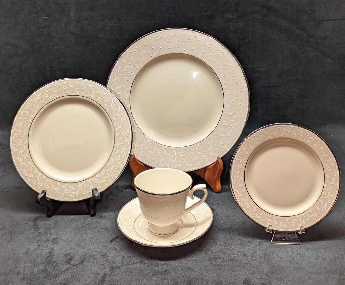 Lenox China Opal Innocence 5 Piece Place Setting D: Lenox China Opal Innocence 5 Piece Place Setting D. This lot includes: (1) Dinner Plate. This is approx 10 3/4" x 10 3/4" x 3/4". (1) Salad Plate. This is approx 8 1/4" x 8 1/4" x