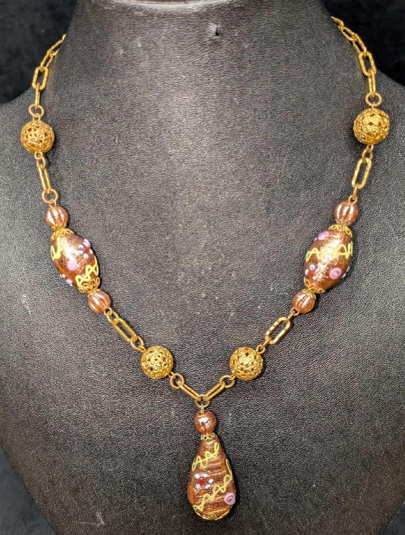 Vintage Italian Murano Art Glass Bead Necklace RTC4: Vintage Italian Murano Art Glass Bead Necklace RTC4. Colorful glass beads with hand painted designs and a brass clasp. This is approx 18" and it weighs 0.08lb.