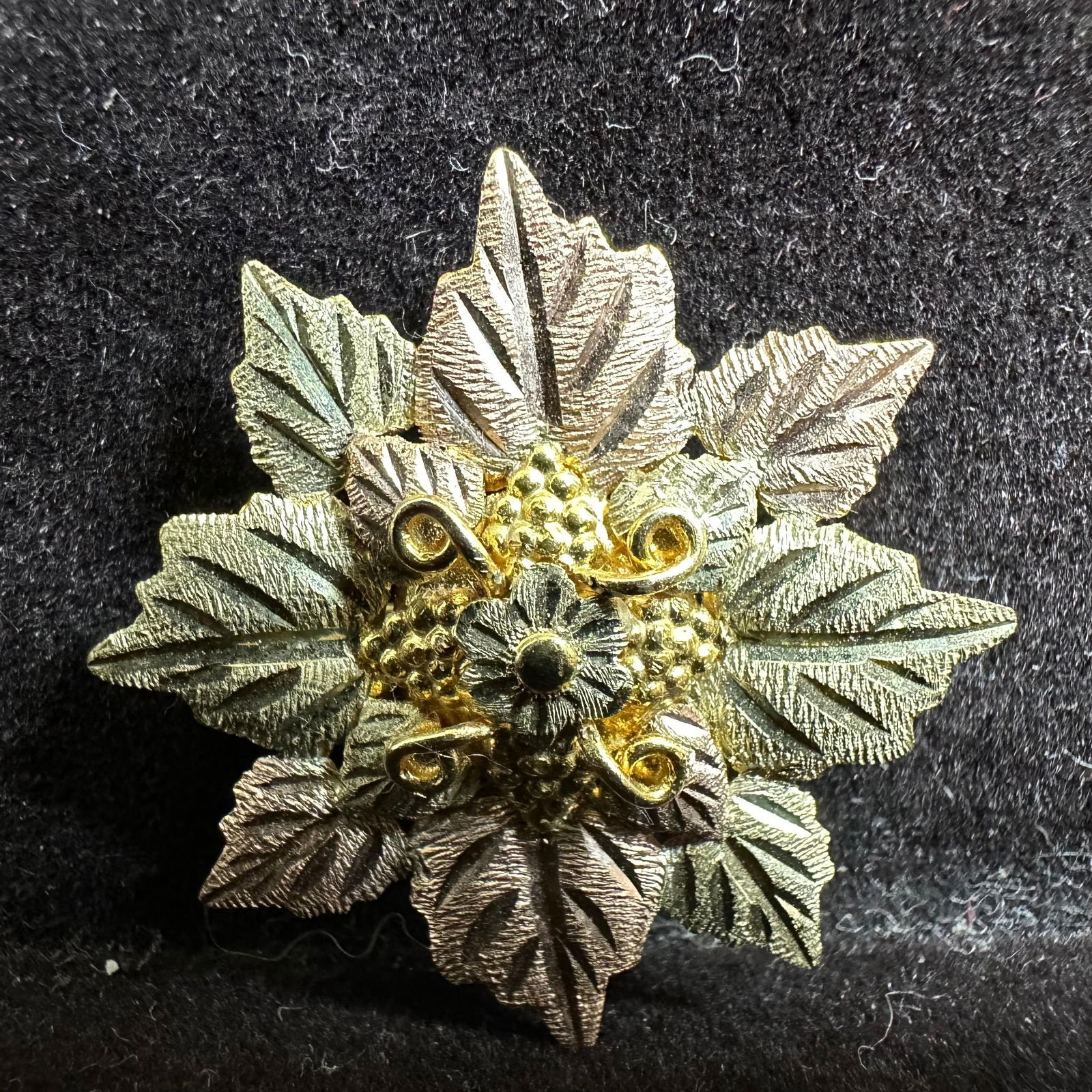 Black Hills 10K Gold Tri Colored Leaf Grape Vine Cluster Brooch Pin: This item is in good pre-owned, previously used/displayed condition with noticeable light wear and surface scratches. Please reference all photos for full details. This piece of jewelry has been teste