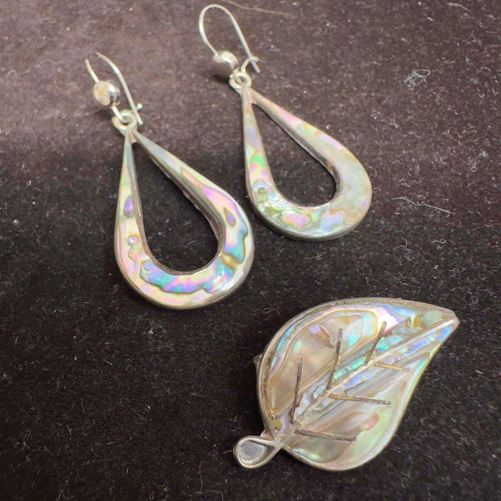 Abalone Tear Drop Shaped Earrings and Leaf Brooch Sterling Silver Set: This item is in good pre-owned, previously used/displayed condition with noticeable light wear, and surface scratches. Please reference all photos for full details. This piece of jewelry has been test