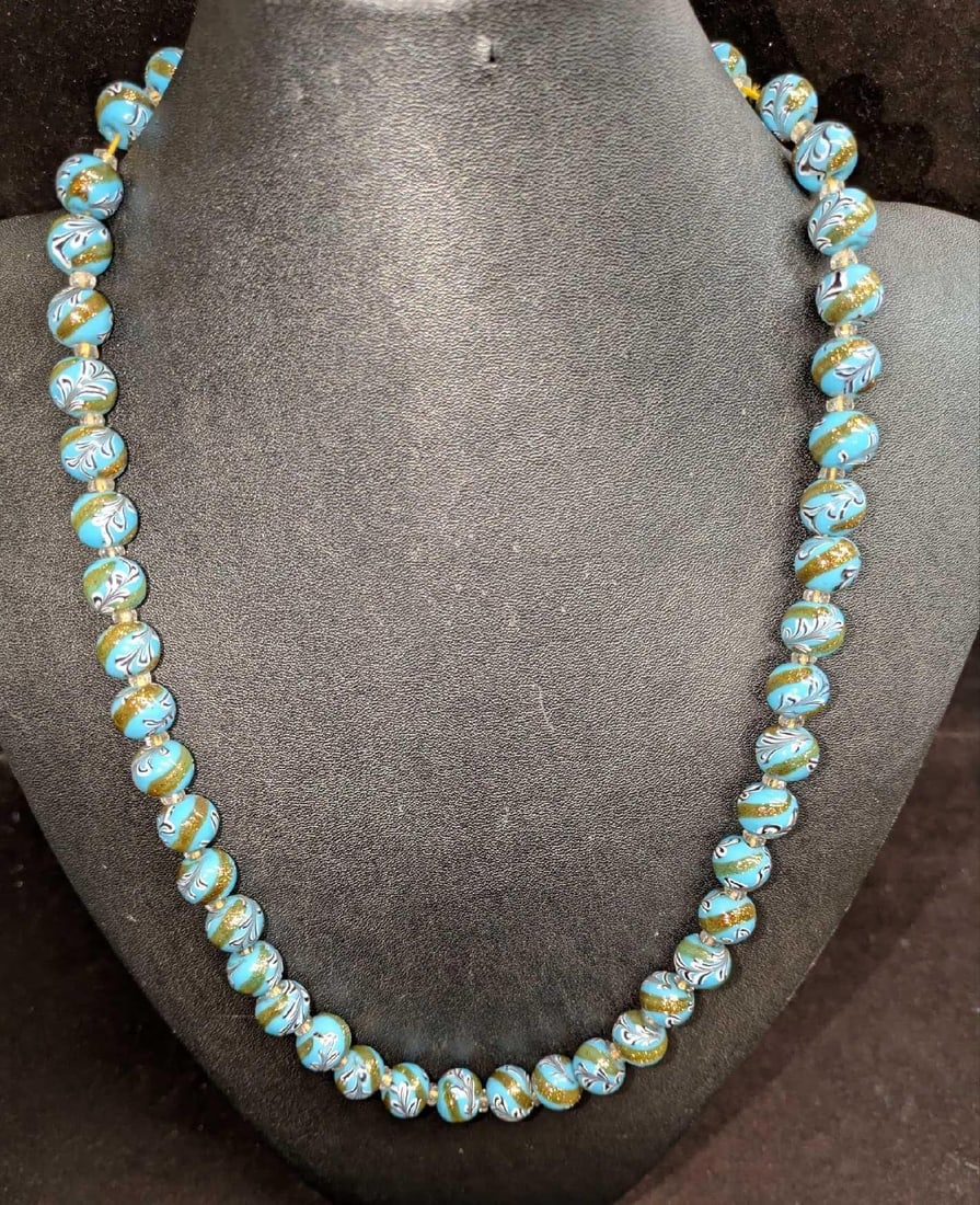 Vintage Italian Murano Art Glass Bead Necklace With Silver Clasp: Vintage Italian Murano Art Glass Bead Necklace With Silver Clasp. Colorful glass beads with hand painted designs and a brass clasp. This is approx 26" and it weighs 0.25lb. The clasp was tested fo
