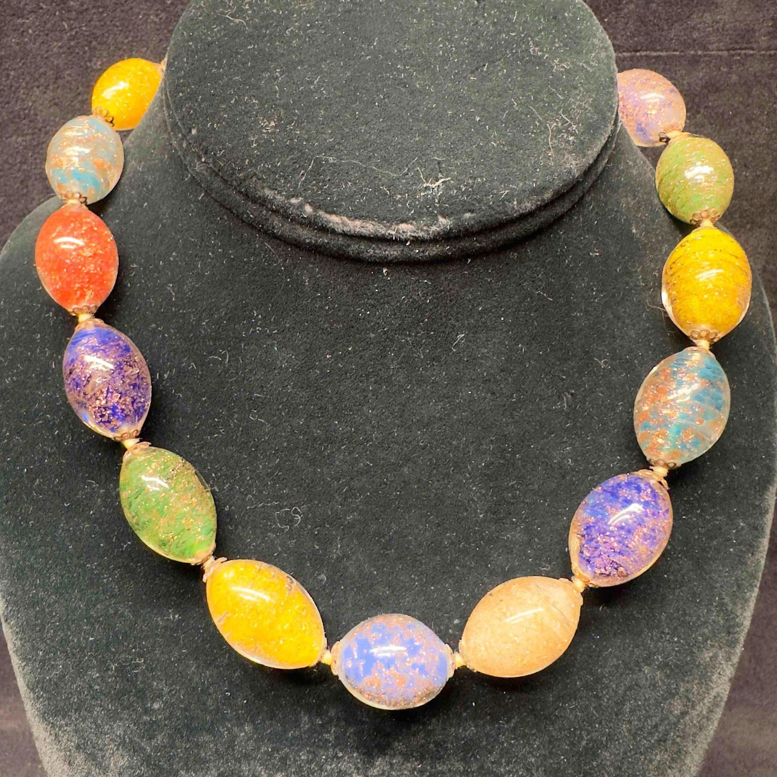 Murano Venetian Art Glass Lamp Work Bead Copper Infused Multi Colored Beaded Necklace C13: Murano Venetian Art Glass Lamp Work Bead Copper Infused Multi Colored Beaded Necklace C13. Necklace with multi colored glass beads with beautiful designs on each. The necklace features copper accents.