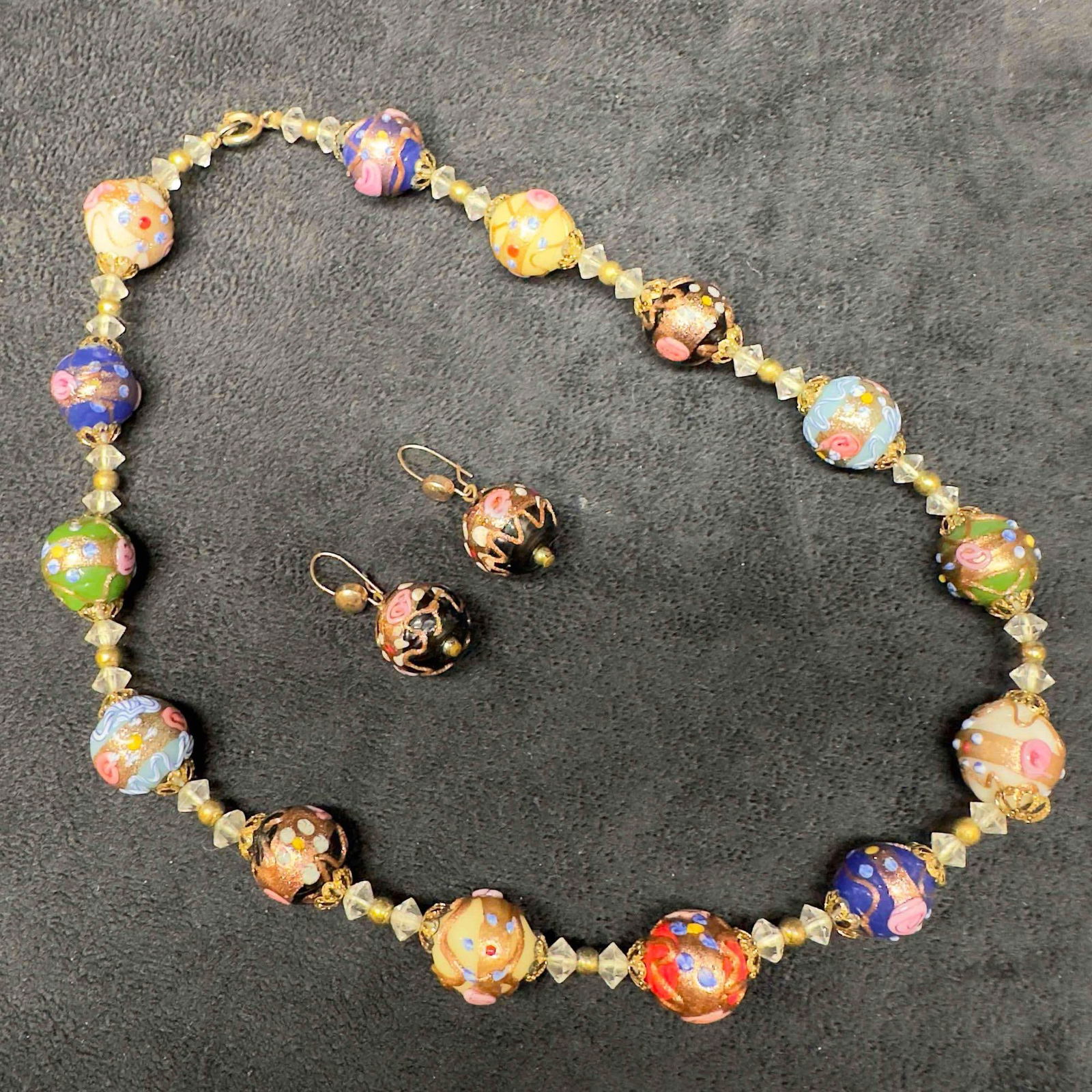 Venetian Murano Lamp Work Glass Multi Colored Round Wedding Cake Bead Necklace and Black Earring Set: Venetian Murano Lamp Work Glass Multi Colored Round Wedding Cake Bead Necklace and Black Earring Set. Necklace and earrings with multi colored glass beads with beautiful hand painted floral designs on