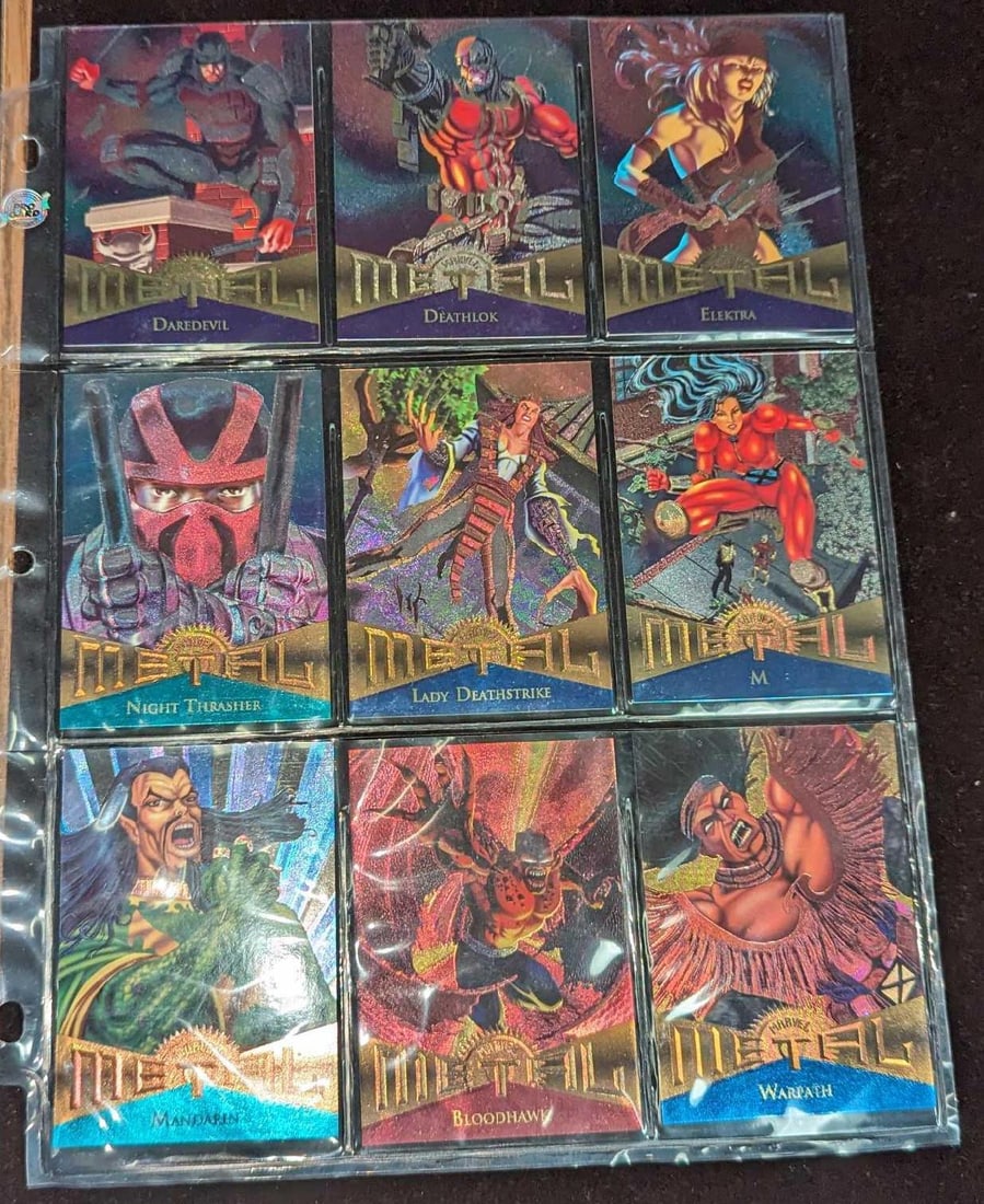 9 Fleer Marvel Metal Trading Cards 3: 9 Fleer Marvel Metal Trading Cards 3. This lot contains: (1) Power Grid - Daredevil #28. (1) Power Grid - Deathlok #29. (1) Power Grid - Eleltra #30. (1) Power