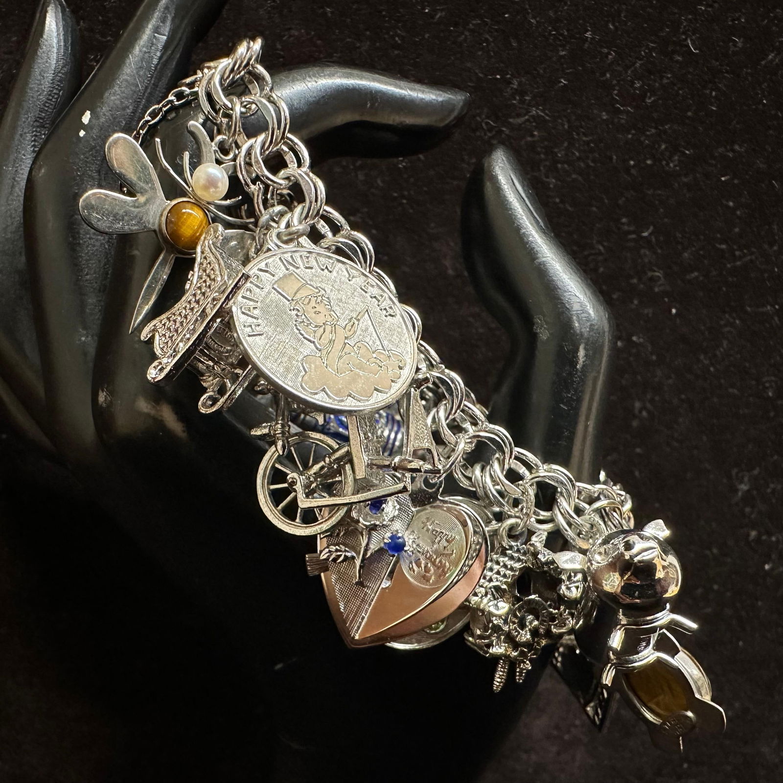 Sterling Silver Multi Charm Bracelet Articulated and Enamel Charms O76: This item is in good pre-owned, previously used/displayed condition with noticeable light wear and surface scratches. Please reference all photos for full details. This piece of jewelry has been teste