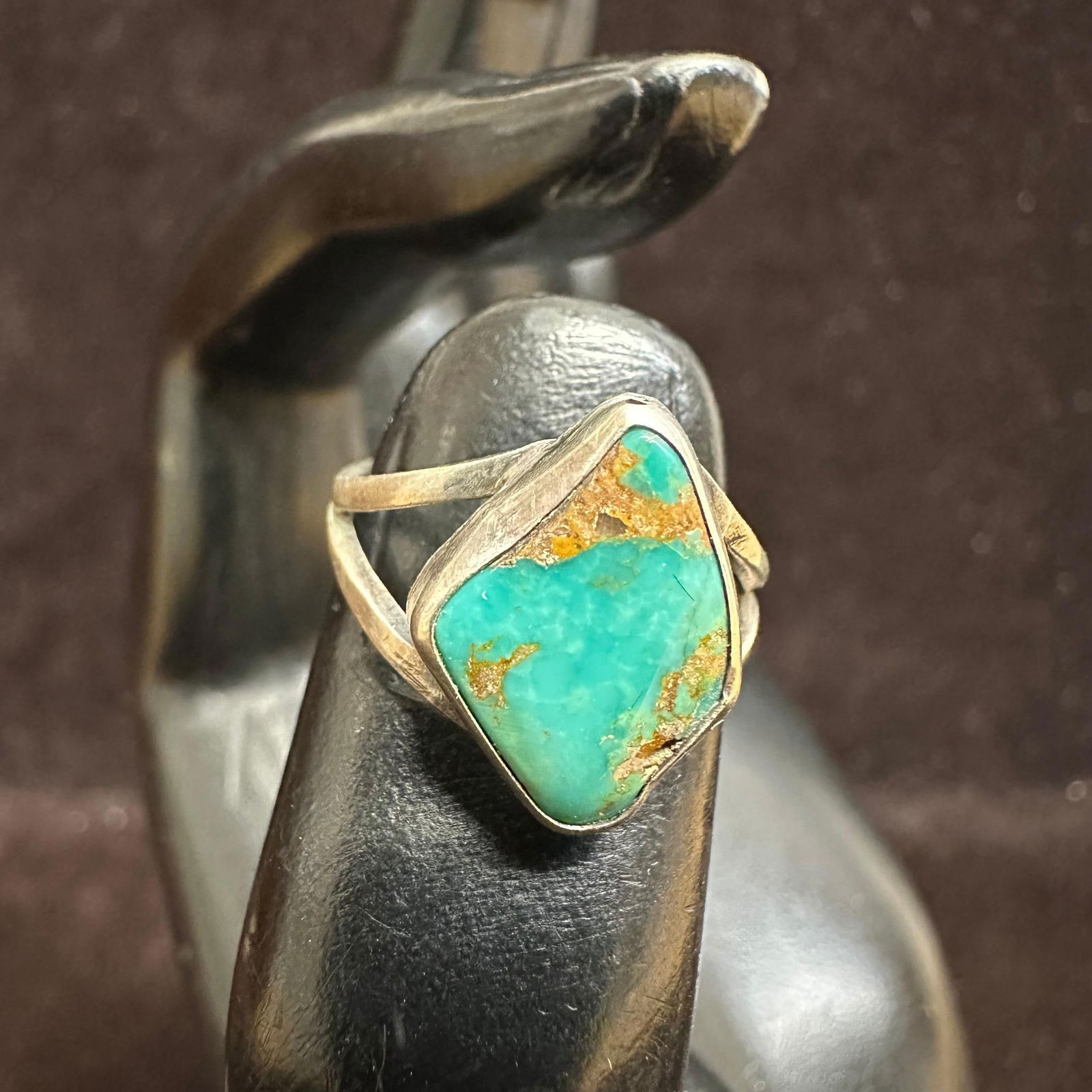 Small Turquoise Unique Shape Silver Ring Size 5: This item is in good pre-owned, previously used/displayed condition with noticeable light wear and surface scratches. Please reference all photos for full details. This piece of jewelry has been teste