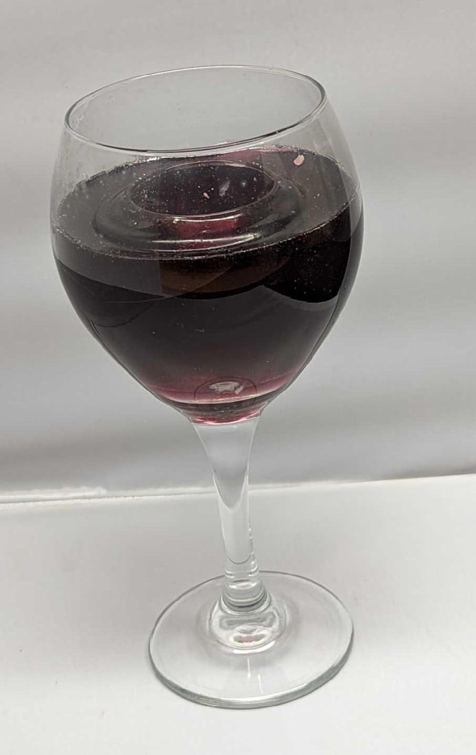 PartyLite Scents Of Illumination Vineyards Candle Holder: PartyLite Scents Of Illumination Vineyards Candle Holder. This retired wine-shaped candle holder is approx 4" x 4" x 8 1/2". It comes in its original box which is approx 6" x 6" x 11" and it wei