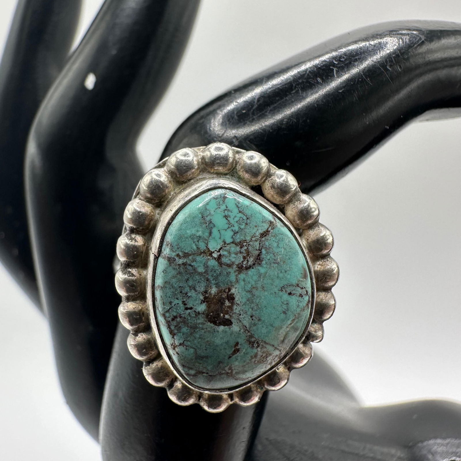 Beaded Border Bezel Turquoise Silver Ring Rain Drop Design Style: This item is in good pre-owned, previously used/displayed condition with noticeable light wear and surface scratches. Please reference all photos for full details. This piece of jewelry has been teste