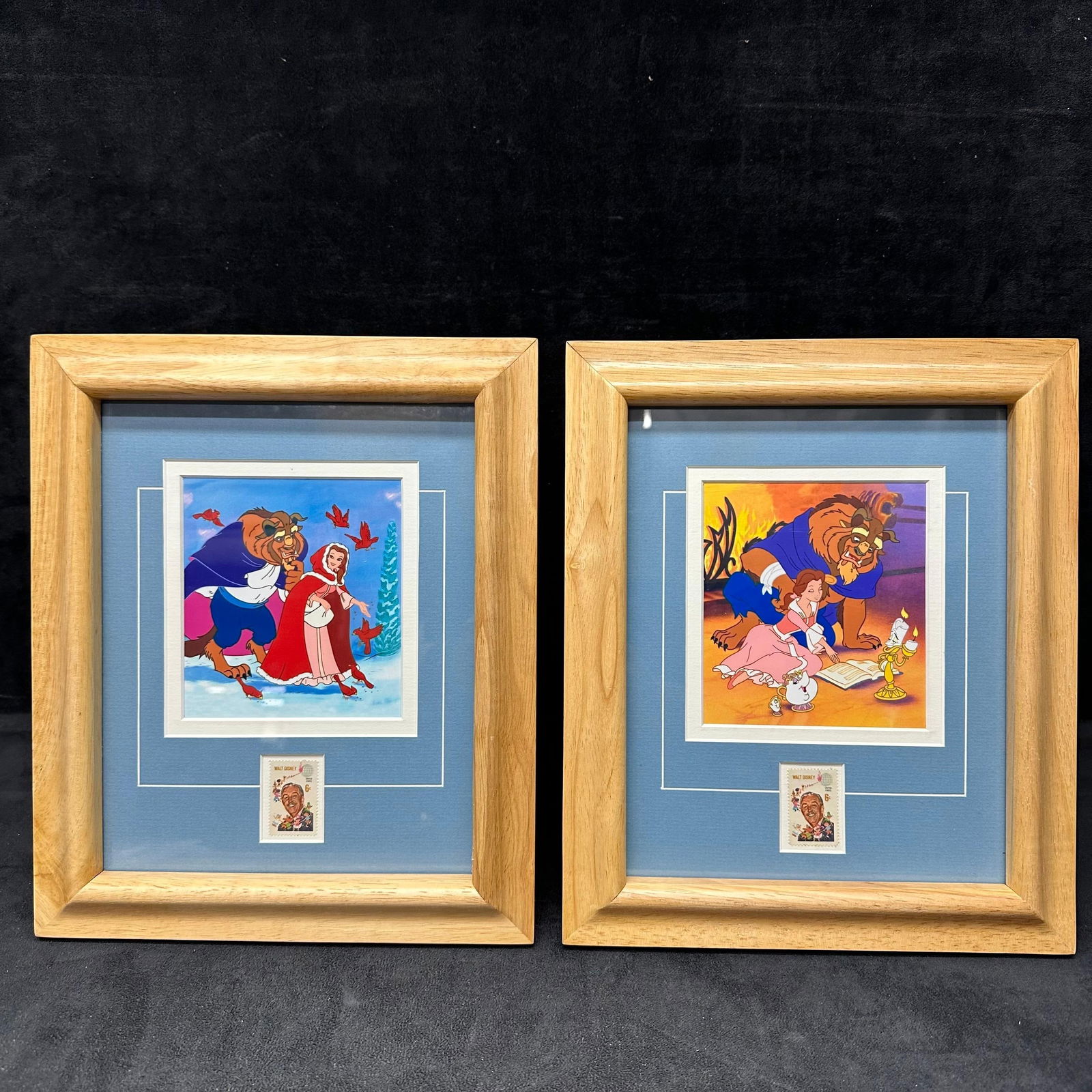 Pair of Framed Disney Beauty and The Beast Animation Art Prints with Walt Disney 6 Cent Stamps: Pair of framed Disney Beauty and the Beast themed animation art prints, each featuring Belle, Beast, and supporting characters in classic scenes. Both pieces are professionally double-matted in blue w